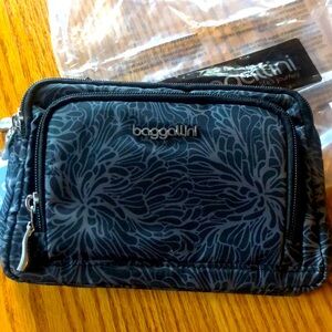 baggalini Triple zip with front wallet nwt.    Also be worn as a belt bag